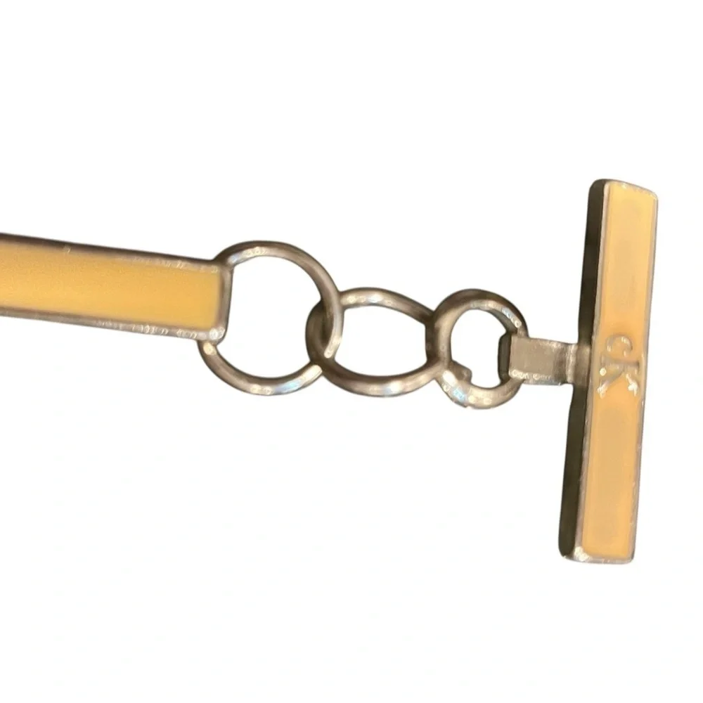 ⭕️Calvin Klein Tan Enamel and Silver Circle Link Belt. Very cool design!